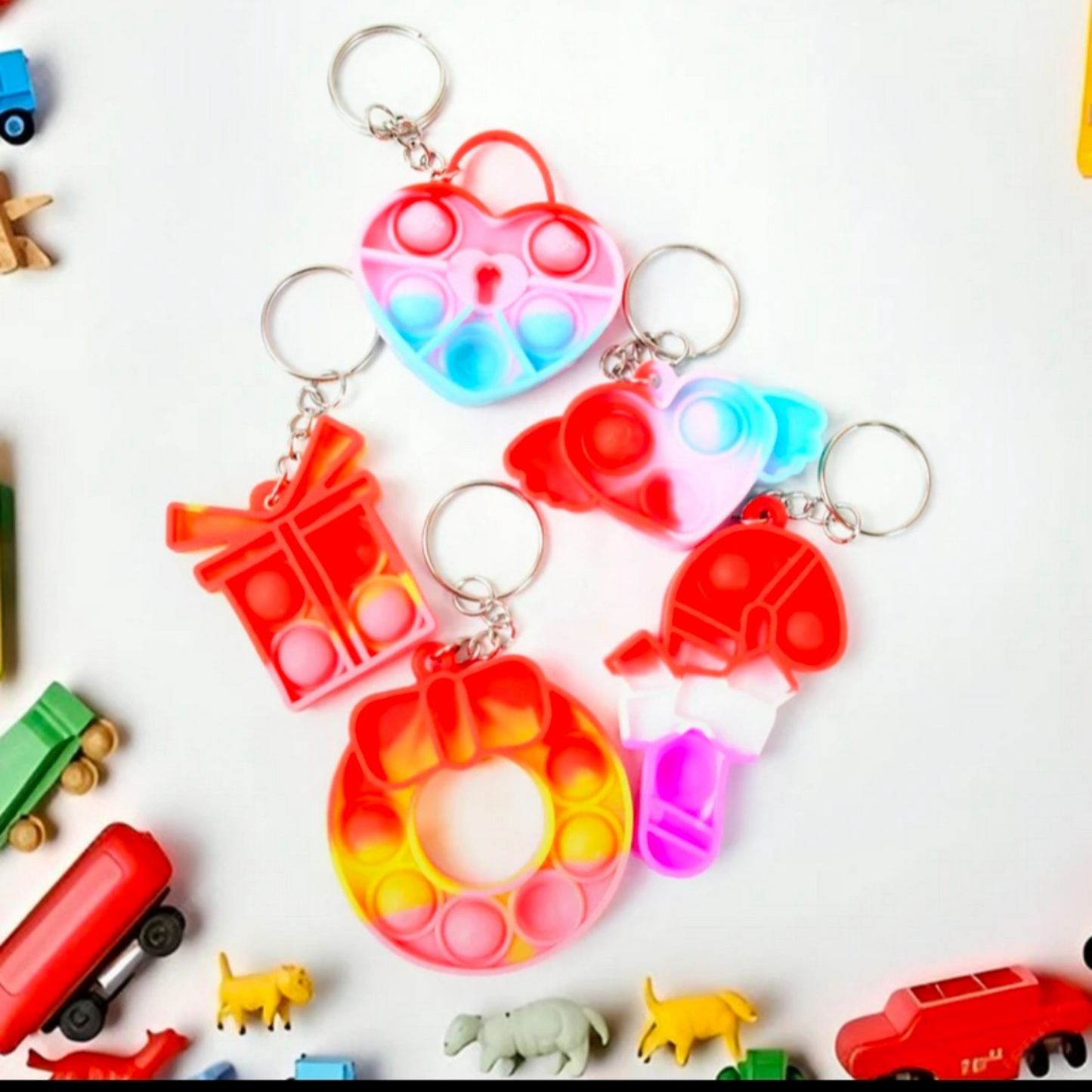 Compact silicon pop It keychain Toy-Gift For Kids Portable Bubble Popping Fun, Stress Relief Fidget Toy (Mix Design - 1 Pc)